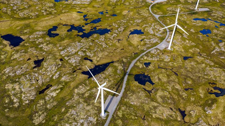 Wind turbines in the arctic tundra in Norway on the Isle of Smola.  (Illustration) (ANTON PETRUS / MOMENT RF / GETTY IMAGES)