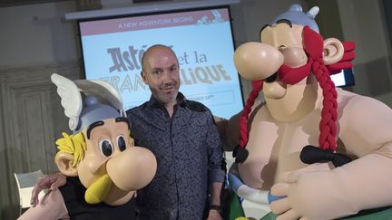 Jean-Yves Ferri le 5 avril 2017 au Salon du livre de jeunesse de Bologne lors de la présentation de la 37e aventure d'Asterix.
 (MIGUEL MEDINA / AFP)