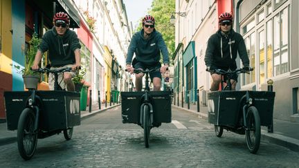 Trois livreurs d'Olvo, une entreprise de&nbsp;cyclo-logistique créée il y a cinq ans et transformée depuis en&nbsp;SCOP, une société coopérative de production. (OLVO)