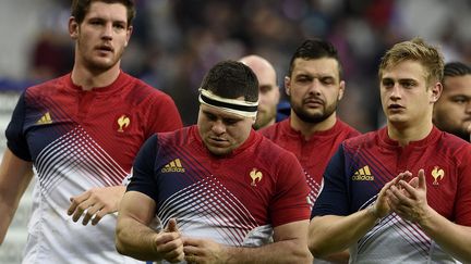 Les rugbymen français après leur victoire contre&nbsp;l'Italie, le 6 février 2016, au stade de France. (FRANCK FIFE / AFP)