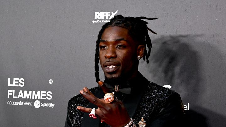 Le rappeur Gazo arrive à la première édition des Flammes, à Paris, le 11 mai 2023. (ZOULERAH NORDDINE / AFP)