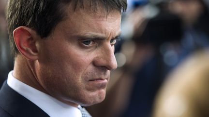 Le ministre de l'Int&eacute;rieur, Manuel Valls, le 25 septembre 2013 &agrave; Conflans-Sainte-Honorine (Yvelines). (FRED DUFOUR / AFP)