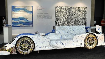 La Renault Alpine A 450 redécorée par l'artiste iranien Ghass dans la nef du Grand Palais de Paris
 (PASCAL HAUSHERR / HANS LUCAS)