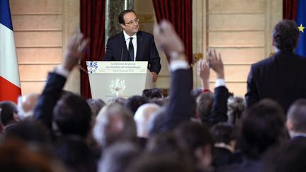 Fran&ccedil;ois Hollande, le 14 janvier 2014 lors de sa conf&eacute;rence de presse &agrave; Paris.&nbsp; (ALAIN JOCARD / AFP)