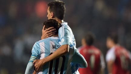 Javier Pastore et Leo Messi  (YURI CORTEZ / AFP)