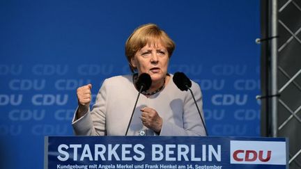 Angela Merkel en campagne pour les élections à Berlin le 14 septembre 2016. (TOBIAS SCHWARZ / AFP)