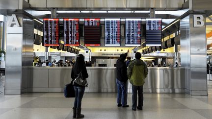 Beaucoup de vols ont &eacute;t&eacute; annul&eacute;s &agrave; l'a&eacute;roport de Morrisville, en Caroline du Nord, en raison de la temp&ecirc;te de neige qui frappe le sud-est des Etats-Unis le 12 f&eacute;vrier 2014. (SARA D. DAVIS / GETTY IMAGES NORTH AMERICA / AFP )