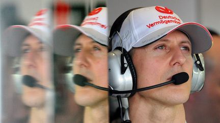 2012 marque la fin de carrière de Michael Schumacher. "Il arrive un moment où il faut dire au revoir", explique Schumi. A presque 44 ans, le septuple champion du monde préfère laisser sa place aux plus jeunes. (TORSTEN BLACKWOOD / AFP)