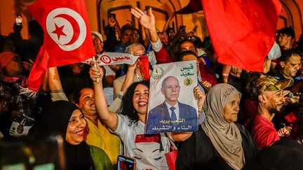 Supporters of Kaïs Saïed celebrate the victory of their presidential candidate, in the streets of Tunis (Tunisia), October 6, 2023. (YASSINE GAIDI / ANADOLU / AFP)