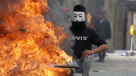 Un manifestant palestinien à Hébron (Cisjordanie), le 7 décembre 2017. (HAZEM BADER / AFP)