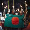 Des habitants de l'enclave indienne de&nbsp;Masaldanga c&eacute;l&egrave;brent l'entr&eacute;e en vigueur de la loi qui rattache&nbsp;leur territoire au Bangladesh, le 1er ao&ucirc;t 2015. (ZAKIR HOSSAIN CHOWDHURY / AFP)