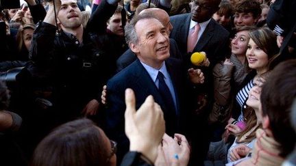 François Bayrou au Salon de l'Education (BERTRAND LANGLOIS / AFP)