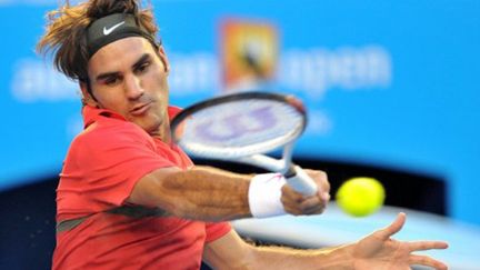 Regard fixé sur la balle pour Roger Federer