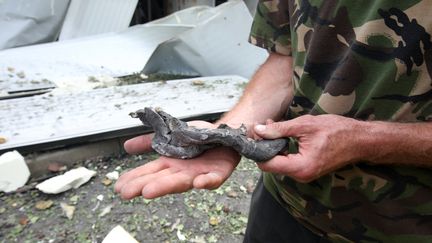 Les restes d'un missile Iskander après une frappe russe à Merefa (Ukraine), le 1er août 2022. (VYACHESLAV MADIYEVSKYY / NURPHOTO / AFP)