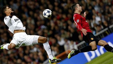 Raphael Varane et Robin Van Persie s'envolent en Ligue des Champions (ALBERTO MARTIN / MAXPPP)