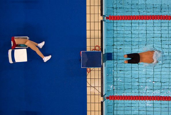 Avi Torres of Spain sets off at the start of the 200m freestyle heats, Paralympic Games, Athens, September 1, 2004.
 (Bob Martin (British, born 1959).)