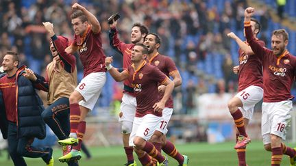 La joie des joueurs romains (GABRIEL BOUYS / AFP)