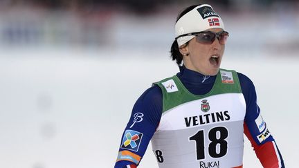 Marit Bjoergen a donné le ton d'entrée cette saison (HEIKKI SAUKKOMAA / LEHTIKUVA)