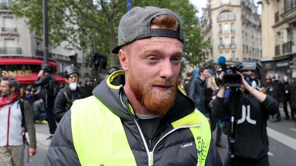 Maxime Nicolle, figure des "gilets jaunes", lors de la manifestation du 1er-Mai 2019, à Paris. (KENZO TRIBOUILLARD / AFP)