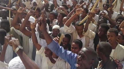 Manifestation de sympathisants du président Omar el-Béchir à Kassala, dans l'est du&nbsp;Soudan, le 7 janvier 2019. (- / AFP)