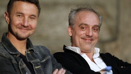 Olivier Besancenot et Philippe Poutou, deux derniers candidats du NPA à la présidentielle. (CHARLY TRIBALLEAU / AFP)