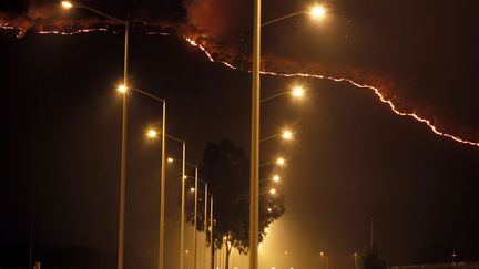 Feux de for&ecirc;t aper&ccedil;us depuis&nbsp;Guadalajara (Mexique), le 24 avril 2012. (ULISES RUIZ BASURTO / EPA / MAXPPP)