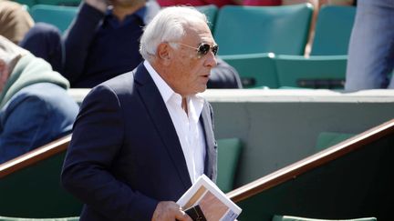 L'ancien directeur du FMI Dominique Strauss-Kahn dans les all&eacute;es de Roland-Garros le 30 mai 2015. (AFP)