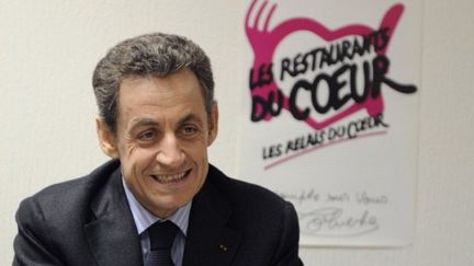 Nicolas Sarkozy a rendu visite à l'association des Restos du coeur jeudi 22 décembre (AFP)