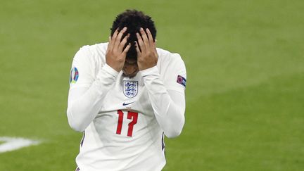 Entré en jeu spécialement pour les tirs au but, Jadon Sancho a manqué sa tentative et participé au couronnement européen de l'Italie à Wembley le 11 juillet 2021. (JOHN SIBLEY / AFP)