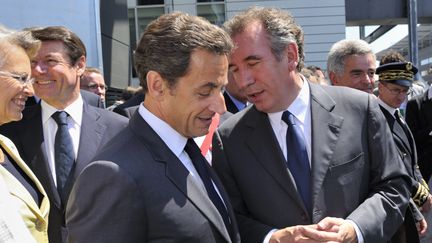 Nicolas Sarkozy et François Bayrou à Bordes (Pyrénées-Atlantiques), le 22 juin 2010.&nbsp; (PHILIPPE WOJAZER / REUTERS)