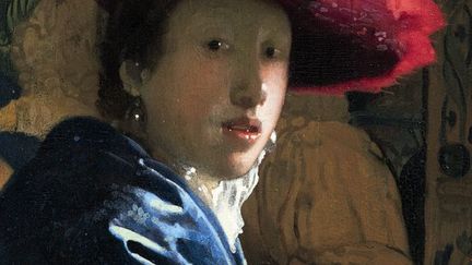 La fille au chapeau rouge (détail), Johannes Vermeer (1665/1667) est l&#039;un des huit tableaux exposés à Rome
 (National Gallery of Art, Washington)