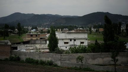 C'est dans cette maison qu'a &eacute;t&eacute; tu&eacute; le chef d'Al Qua&iuml;da, Oussama Ben Laden, le 5 mai 2011.&nbsp; (ASIF HASSAN / AFP)