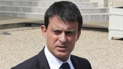 Le ministre de l'Int&eacute;rieur, Manuel Valls, r&eacute;pond aux questions des journalistes, le 24 juillet 2013 &agrave; l'Elys&eacute;e, &agrave; Paris. (FRANCOIS GUILLOT / AFP)