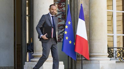 Le Premier ministre, Edouard Phipippe, sur les marches de l'Elysée, le 3 août 2018. (GEOFFROY VAN DER HASSELT / AFP)