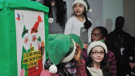 Photo d'illustration de&nbsp;la campagne des Peres Noel verts du Secours Populaire Francais. (BRUNO LEVESQUE / MAXPPP)