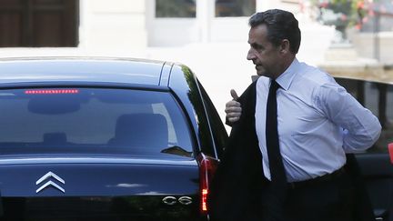 L'ancien pr&eacute;sident, Nicolas Sarkozy, arrive &agrave; l'Assembl&eacute;e nationale, &agrave; Paris, pour la remise d'un prix, le 25 juin 2014.&nbsp; (GONZALO FUENTES / REUTERS)