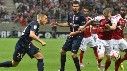 Les Rémois ont mené au score, ont ensuite souffert, mais ont tenu le PSG en échec (PHILIPPE HUGUEN / AFP)