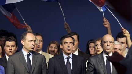 Jean-François Copé, François Fillon et Alain Juppé en meeting à Bordeaux, le 3 mai 2012. (AFP - Jean-Pierre Muller)