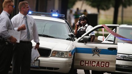 Un officier de police à Chicago (Illinois, Etats-Unis), le 20 septembre 2013. (SCOTT OLSON / GETTY IMAGES NORTH AMERICA / AFP)