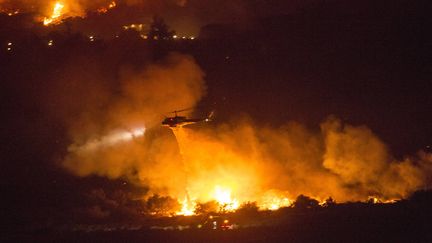 Un feu de forêt à Yucaipa, en Californie (Etats-Unis), le 5 septembre 2020.&nbsp; (RINGO H.W. CHIU / AP / SIPA)