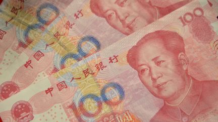 La Chine a de nouveau d&eacute;valu&eacute; sa monnaie, mercredi 12 ao&ucirc;t. (PETER PARKS / AFP)