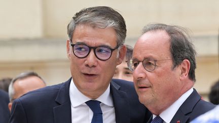 Olivier Faure, First Secretary of the PS, and François Hollande, former President of the Republic and new PS MP for Corrèze. (BERTRAND GUAY / AFP)