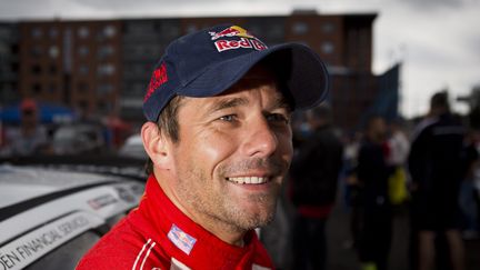 Le pilote S&eacute;bastien Loeb, apr&egrave;s sa victoire lors du rallye de Finlande, le 4 ao&ucirc;t 2012.&nbsp; (RONI REKOMAA / AFP)