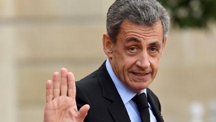 Guillaume Pépy (à gauche) et Nicolas Sarkozy (à droite)&nbsp; (ERIC PIERMONT / AFP)