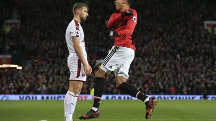 Lingard a marqué un doublé pour sauver les Red Devils face à Burnley. (LINDSEY PARNABY / AFP)