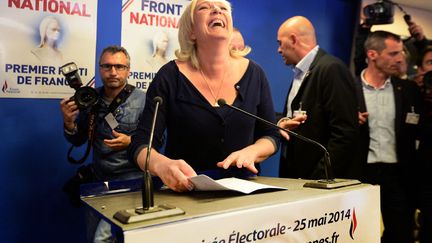 La pr&eacute;sidente du Front national Marine Le Pen laisse &eacute;clater sa joie &agrave; son quartier g&eacute;n&eacute;ral alors que son parti est donn&eacute; en t&ecirc;te aux &eacute;lections europ&eacute;ennes en France, Nanterre (Hauts-de-Seine), le 25 mai 2014. (PIERRE ANDRIEU / AFP)