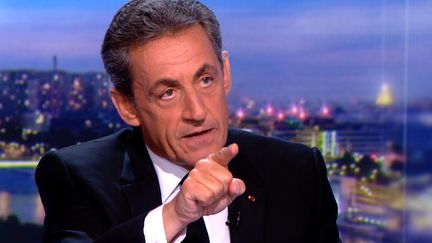 Nicolas Sarkozy sur le plateau du 20 heures de TF1, jeudi 22 mars 2018.&nbsp; (TF1 / AFP)