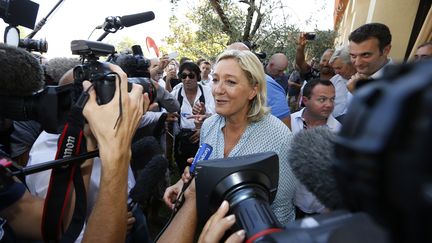 Marine Le Pen, pr&eacute;sidente du Front national, le 7 septembre 2014 &agrave; Fr&eacute;jus (Var). (VALERY HACHE / AFP)