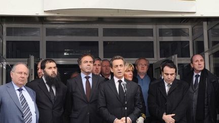 Luc Chatel et Nicolas Sarkozy à Toulouse (19 mars 2012) (ERIC CABANIS / POOL / AFP)