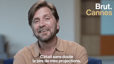 Double lauréat de la Palme d’or, il orchestre cette année comme président du Jury du Festival de Cannes 2023. Ruben Östlund échange avec Brut sur son rapport à la salle de cinéma et aux films.